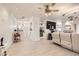 Open-concept living area with views into the kitchen and dining space, enhanced by natural light at 2050 W Warm Springs Rd # 3624, Henderson, NV 89014