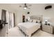 Elegant main bedroom with plush bedding, stylish furniture, and natural light at 2050 W Warm Springs Rd # 3624, Henderson, NV 89014