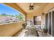 Relaxing patio with a dining table and chairs and a view of the beautiful neighborhood at 2050 W Warm Springs Rd # 3624, Henderson, NV 89014