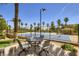 Outdoor patio with view of community tennis court, trees and surrounding neighborhood at 2050 W Warm Springs Rd # 3624, Henderson, NV 89014