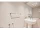 The sleek bathroom features a stylish pedestal sink and a large mirror for a modern touch at 222 Karen Ave # 2305, Las Vegas, NV 89109