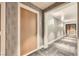 The hallway has unique wall and floor coverings, and decorative lighting to make it stand out at 222 Karen Ave # 2305, Las Vegas, NV 89109