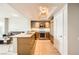 Modern kitchen with stainless steel appliances and granite countertops opens to a comfortable living area at 222 Karen Ave # 2305, Las Vegas, NV 89109