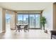 Bright living room with tile floors, floor to ceiling windows, and stunning city views at 222 Karen Ave # 2305, Las Vegas, NV 89109