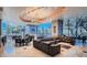 Expansive living room with floor-to-ceiling windows, plush seating, and sleek modern design at 222 Karen Ave # 2305, Las Vegas, NV 89109
