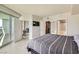 Spacious main bedroom with doors leading to a private balcony and en suite bathroom and walk-in closet at 222 Karen Ave # 2305, Las Vegas, NV 89109