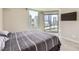 Main bedroom with city views and access to a private balcony for ultimate relaxation at 222 Karen Ave # 2305, Las Vegas, NV 89109