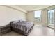 Well-lit main bedroom features stunning city views and access to a private balcony at 222 Karen Ave # 2305, Las Vegas, NV 89109