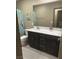 Charming bathroom with a spacious vanity and colorful bluey themed shower curtain at 2645 Cava Tirreni St, Henderson, NV 89044