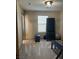Versatile exercise area with fitness equipment, soft lighting, and neutral carpet flooring at 2645 Cava Tirreni St, Henderson, NV 89044