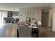 Dining area open to the modern kitchen with granite countertops at 2645 Cava Tirreni St, Henderson, NV 89044
