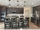 Beautiful kitchen with granite countertops, stainless steel appliances, and pendant lighting at 2645 Cava Tirreni St, Henderson, NV 89044