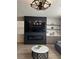 Cozy living room with a fireplace and built-in shelving at 2645 Cava Tirreni St, Henderson, NV 89044