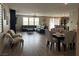 Spacious open-concept living room featuring dining space and kitchen at 2645 Cava Tirreni St, Henderson, NV 89044