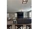 Open concept living area with built in shelves and entertainment center at 2645 Cava Tirreni St, Henderson, NV 89044
