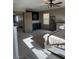 Spacious main bedroom with a ceiling fan and en-suite bathroom access at 2645 Cava Tirreni St, Henderson, NV 89044