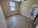 Bedroom featuring modern plank flooring, a window, and neutral walls at 2653 Crystal Blue St, Laughlin, NV 89029