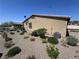 The home features low-maintenance gravel landscaping, neutral stucco, and a terracotta roof at 2653 Crystal Blue St, Laughlin, NV 89029