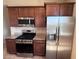 Updated kitchen with stainless steel appliances and granite countertops at 2653 Crystal Blue St, Laughlin, NV 89029