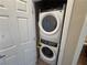 Laundry closet with a stacked washer and dryer unit at 2653 Crystal Blue St, Laughlin, NV 89029