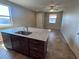 Spacious living room with a ceiling fan, recessed lighting, and tile floors at 2653 Crystal Blue St, Laughlin, NV 89029