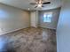 Bright living room with tile flooring, natural light, and neutral walls at 2653 Crystal Blue St, Laughlin, NV 89029
