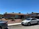 Charming single-story home with a well-kept front yard and driveway with a parked car at 2657 Kline Cir, Las Vegas, NV 89121
