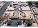 Aerial view showcases property with desert landscaping, detached garages, and potential for customizations at 2755 E Russell Rd, Las Vegas, NV 89120