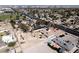 A high-angle aerial view featuring residential neighborhood with desert landscaping, a home and other amenities at 2755 E Russell Rd, Las Vegas, NV 89120