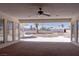 A view of the partially covered patio and landscape at 2755 E Russell Rd, Las Vegas, NV 89120