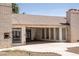 Exterior of the home features a back patio and large windows at 2755 E Russell Rd, Las Vegas, NV 89120