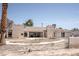 Single story brick home featuring a large backyard with desert landscaping at 2755 E Russell Rd, Las Vegas, NV 89120