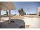 Home featuring desert landscaping, covered porch and brick exterior at 2755 E Russell Rd, Las Vegas, NV 89120