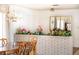 Cozy dining room featuring a decorative partition and elegant lighting at 2755 E Russell Rd, Las Vegas, NV 89120