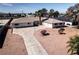 Spacious single-story home with an extended driveway, desert landscaping, and attached two-car garage at 2755 E Russell Rd, Las Vegas, NV 89120