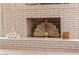 Close up of decorative fireplace with mantel and display items at 2755 E Russell Rd, Las Vegas, NV 89120