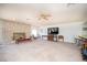 Expansive living room with stone fireplace and plenty of seating at 2755 E Russell Rd, Las Vegas, NV 89120