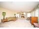 Cozy living room with a decorative brick fireplace and classic furnishings at 2755 E Russell Rd, Las Vegas, NV 89120