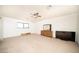 Spacious main bedroom featuring a large window, a dresser, and a mounted television at 2755 E Russell Rd, Las Vegas, NV 89120