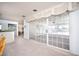 A spacious area offering direct access to the patio through sliding glass doors at 2755 E Russell Rd, Las Vegas, NV 89120