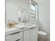Modern bathroom features white cabinets, quartz counters, and a glass shower with upscale fixtures at 2797 Turtle Head Peak Dr, Las Vegas, NV 89135