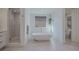 Serene bathroom with freestanding tub, walk-in shower, and modern fixtures at 2797 Turtle Head Peak Dr, Las Vegas, NV 89135