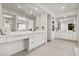 Sleek, modern bathroom with double vanity, and plenty of drawers for storage at 2797 Turtle Head Peak Dr, Las Vegas, NV 89135