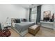 This bedroom is adorned with a cozy bed, stylish decor, and a functional desk, creating a comfortable living space at 2797 Turtle Head Peak Dr, Las Vegas, NV 89135