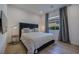 Comfortable bedroom with stylish decor, plush bedding, and ample natural light at 2797 Turtle Head Peak Dr, Las Vegas, NV 89135