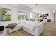 Spacious living area showcasing a large sectional sofa, hardwood floors, and mountain views at 2797 Turtle Head Peak Dr, Las Vegas, NV 89135