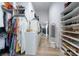Spacious walk-in closet with custom shelving and racks for optimal clothing and accessory storage at 2797 Turtle Head Peak Dr, Las Vegas, NV 89135