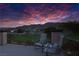 Enjoy mountain and golf course views from this inviting outdoor balcony with comfortable seating at 2837 Turtle Head Peak Dr, Las Vegas, NV 89135