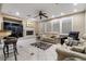 Cozy living room with a fireplace, recessed lighting, tile floors, and comfortable seating at 2837 Turtle Head Peak Dr, Las Vegas, NV 89135