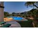 Inviting pool and jacuzzi offers a relaxing outdoor space with a view of the nearby golf course and mountains at 2837 Turtle Head Peak Dr, Las Vegas, NV 89135